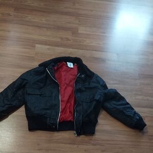 Sleek Black Bomber Jacket with Vibrant Red Interior